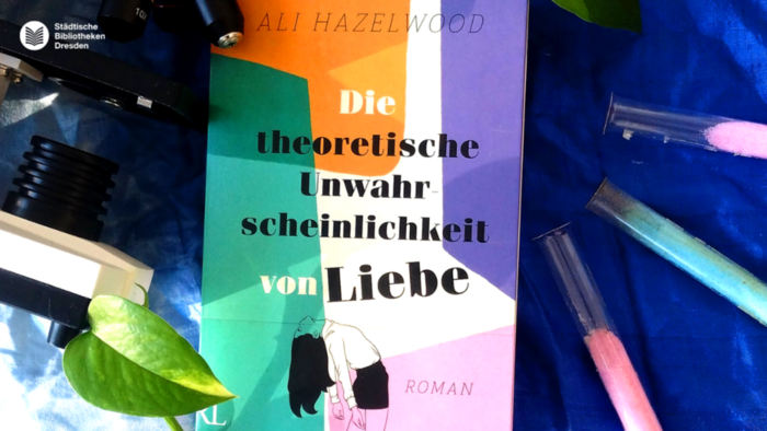 Buch, Fotokamera, Reagenzgläser